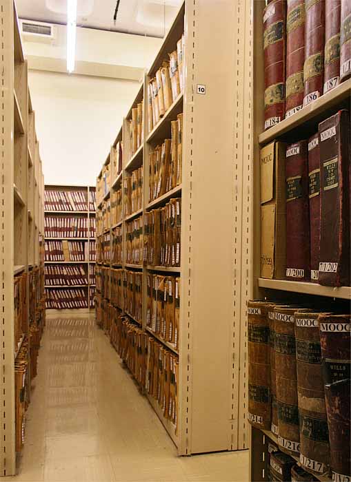2. Archives on the shelves in a stack room